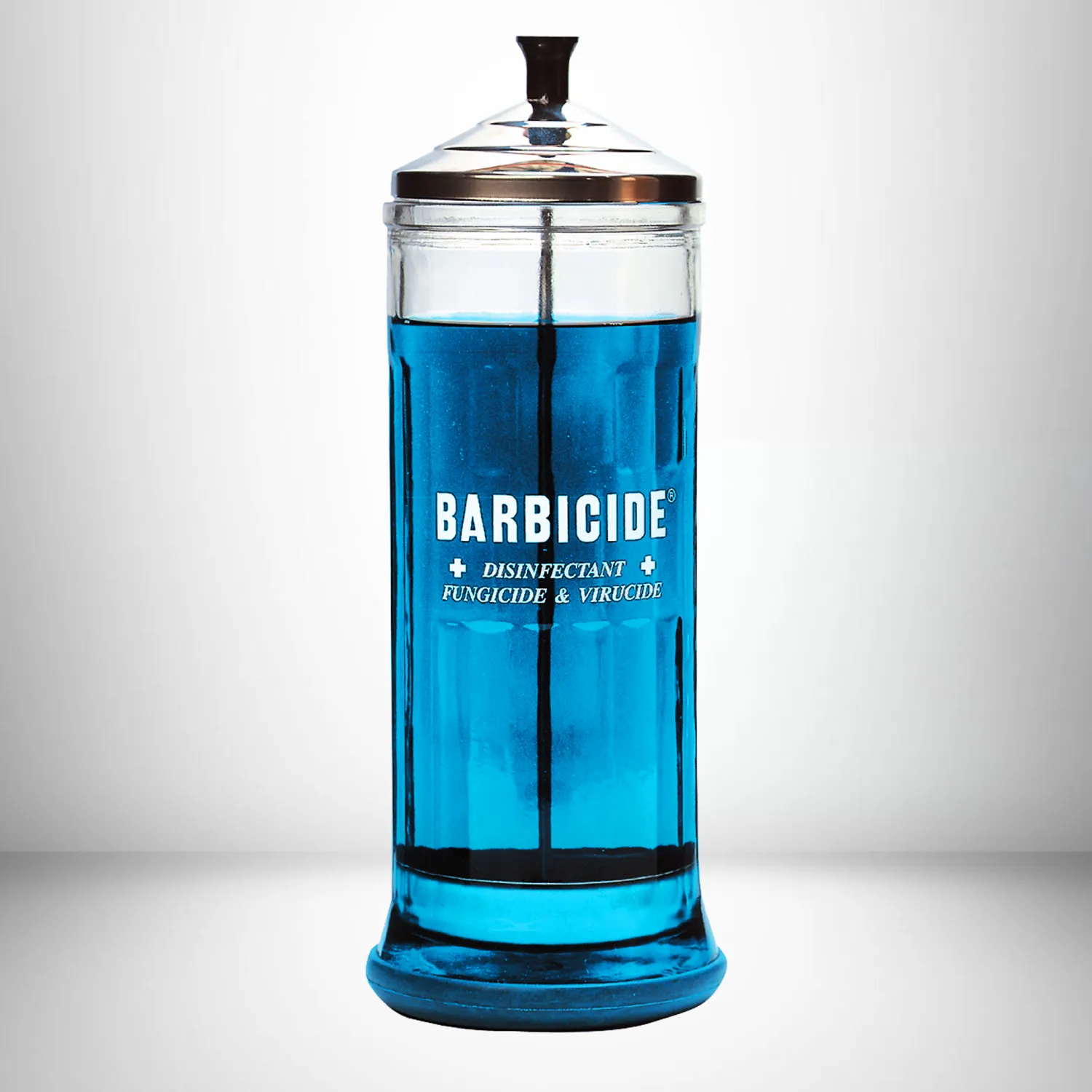 Disinfecting Barbicide Jar